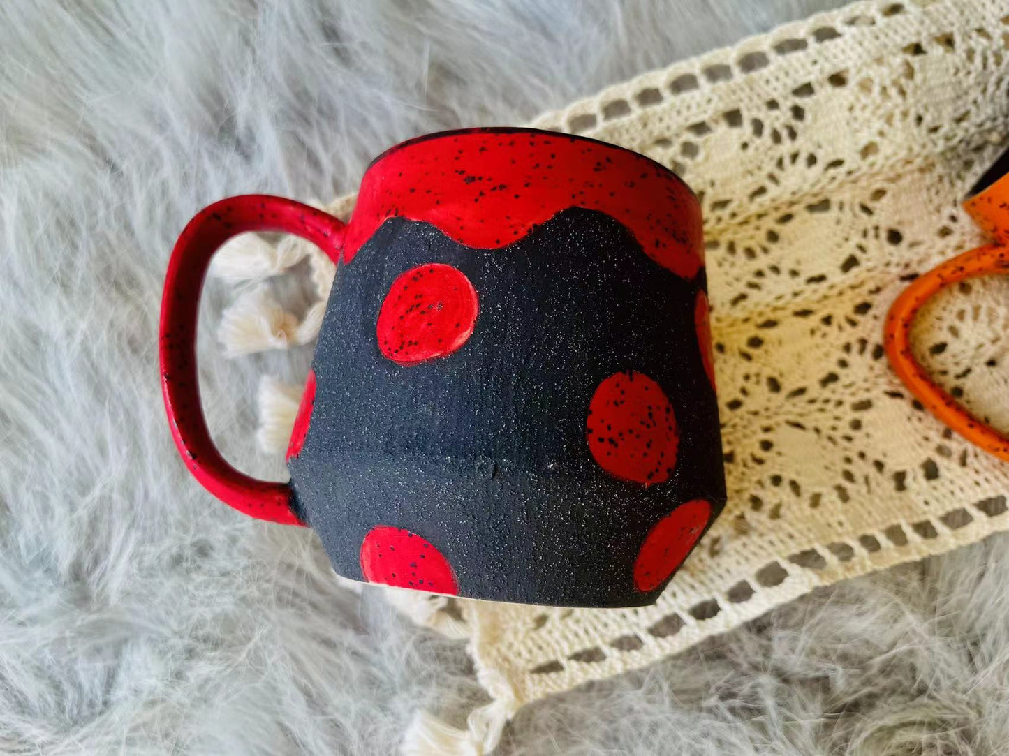 Handmade Ceramic Mug – Black with Bold Red & Orange Dots, Unique Pottery Cup