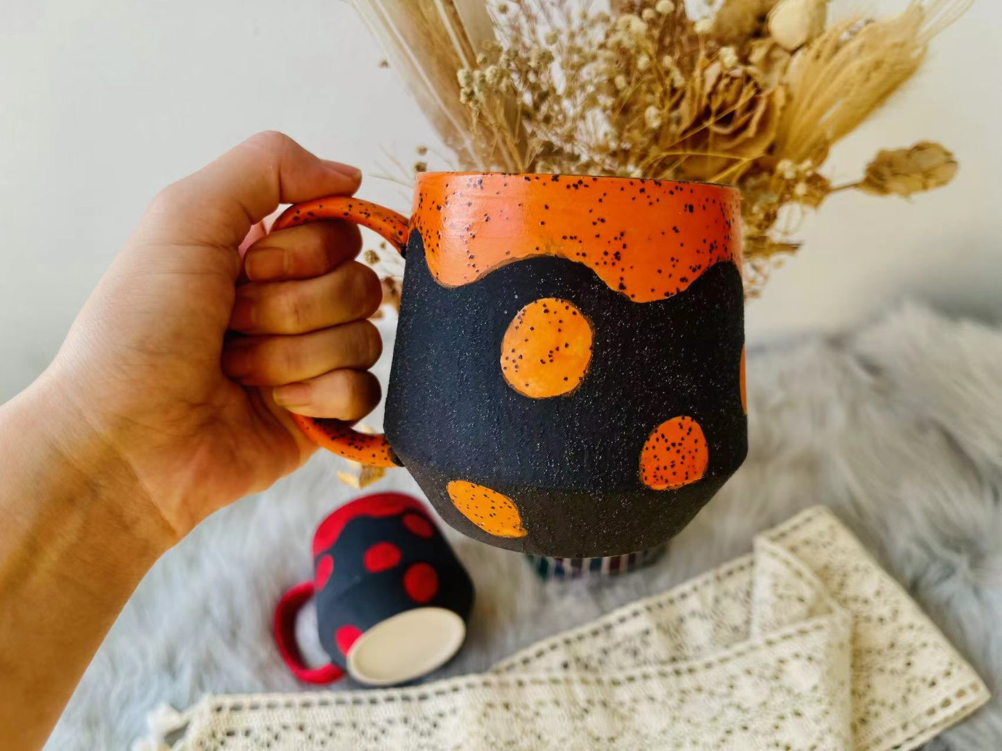 Handmade Ceramic Mug – Black with Bold Red & Orange Dots, Unique Pottery Cup