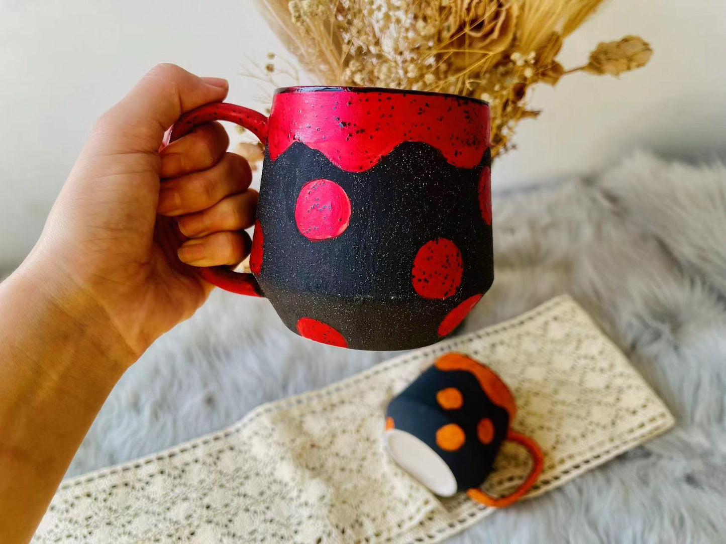 Handmade Ceramic Mug – Black with Bold Red & Orange Dots, Unique Pottery Cup