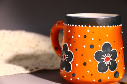 Handmade Bold Orange Ceramic Mug  – Hand-Painted Flowers & Polka Dots Design